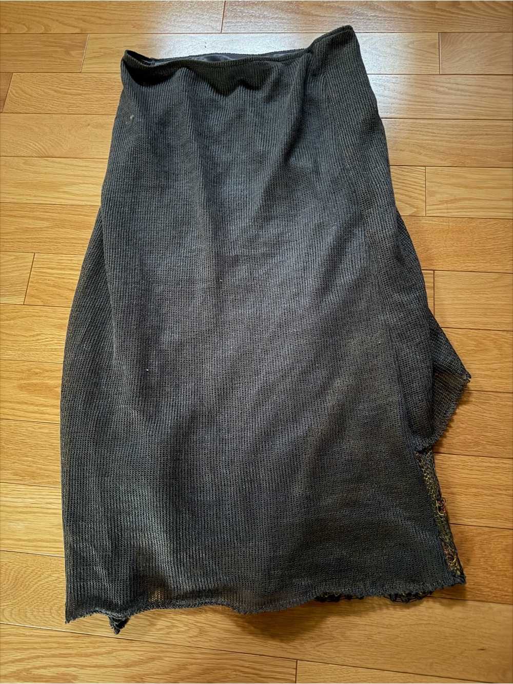 The SITA MURT  mid-length skirt with an asymmetrical wrap design in size 44